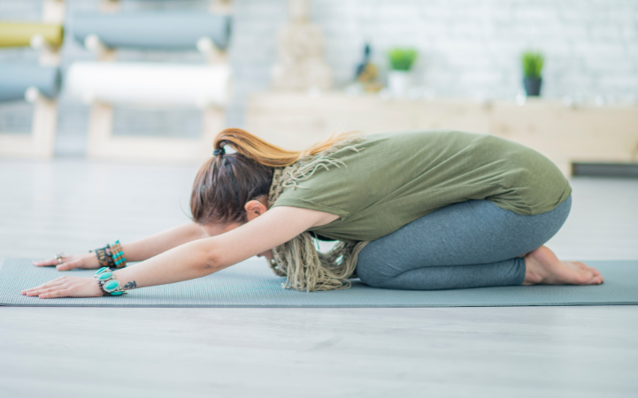 Yoga sequence showing Child's Pose integrated between standing poses